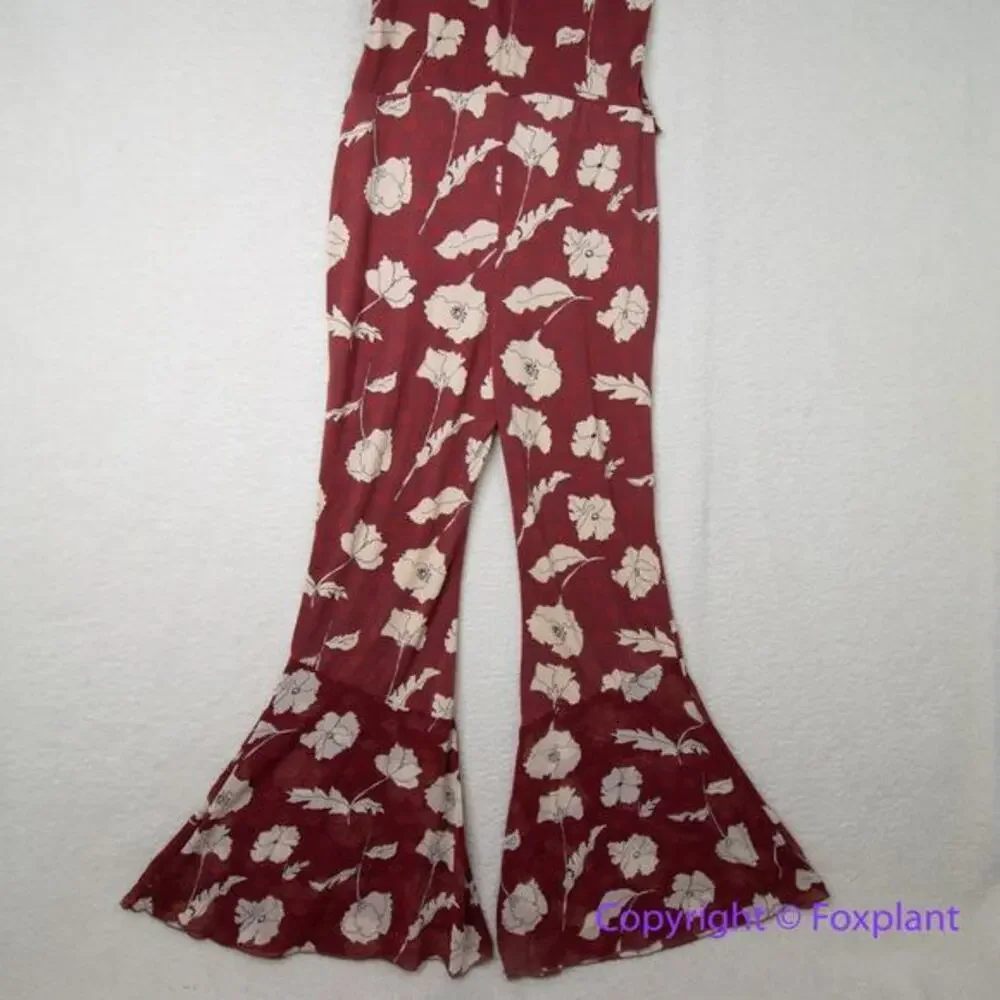 New! Free People AUSTYN brick red floral flaired‎ pant ruffle jumpsuit, size M